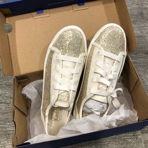 Keds girls gold and cream sparkle shoes.